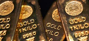 Золото торгуется у 3-месячного минимума из-за роста доллара